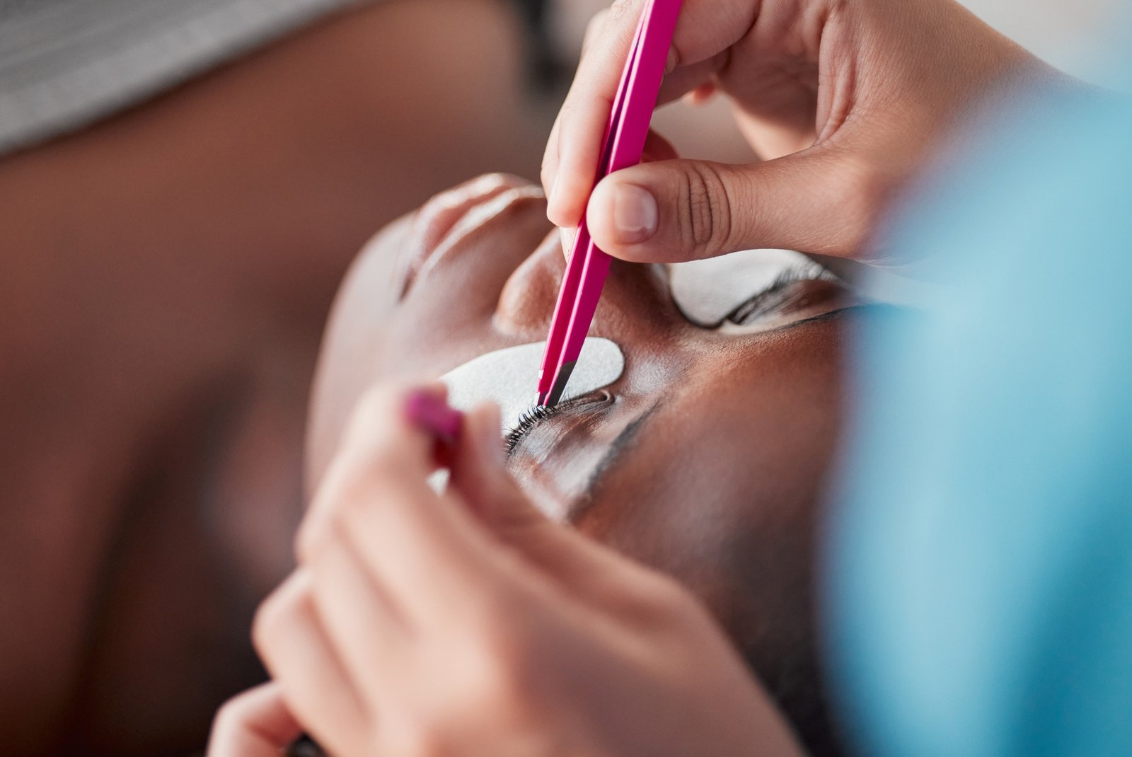 Beauty, eyelash extensions and salon with black woman for self care, makeup and cosmetology. Relax,